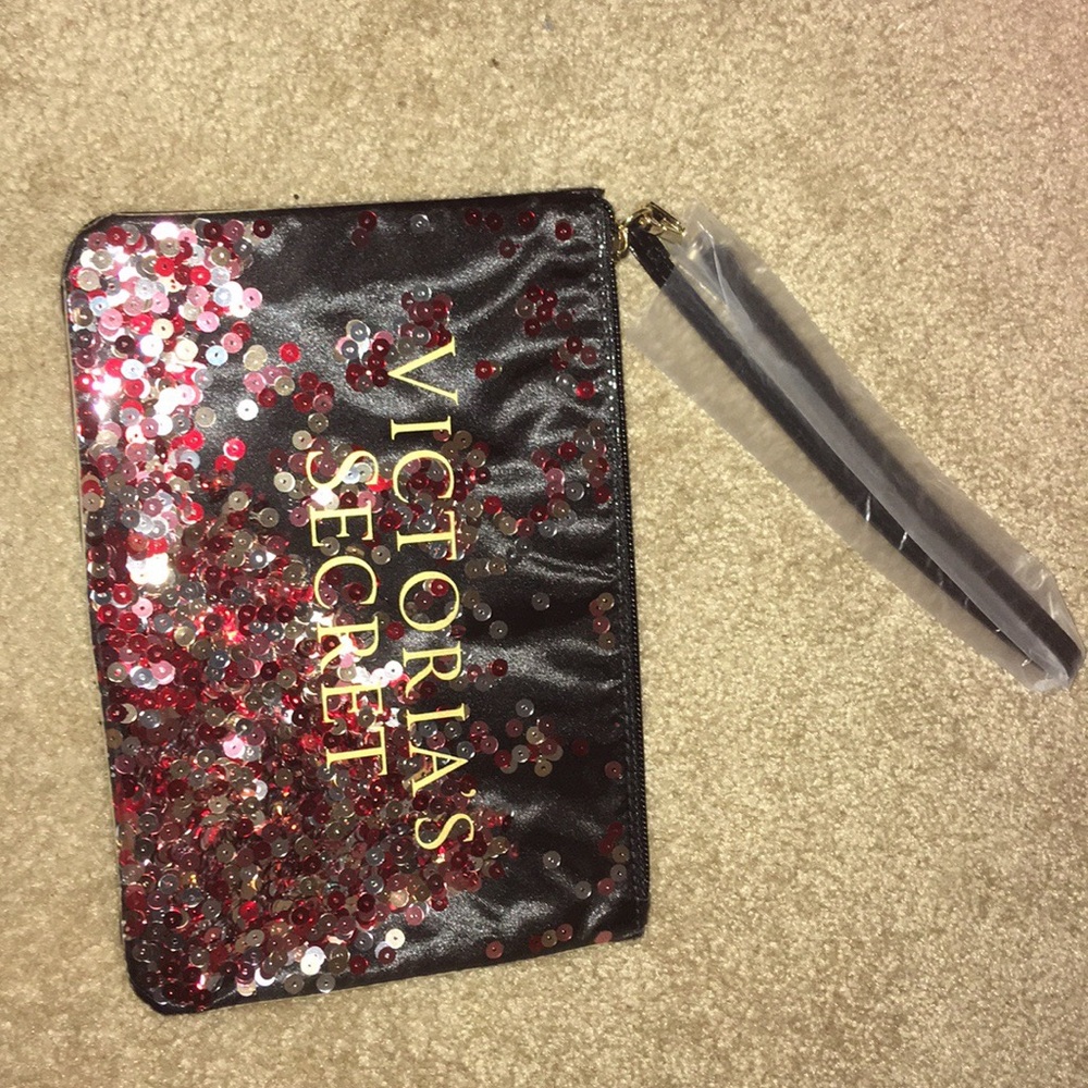 Sequin Filled Black Wristlet Bag.